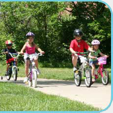 Children riding on the bike path