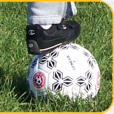 foot on soccer ball
